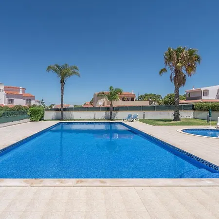 Апартаменти Garden View With Pool By Homing *